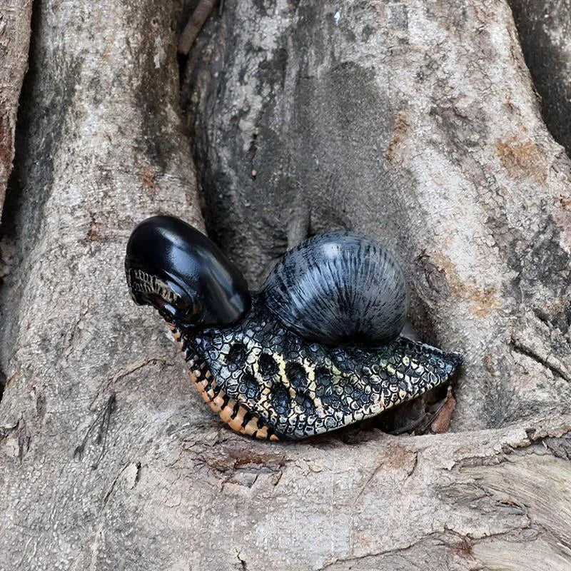 Modern simple resin sculpture of a snail character for garden or home decoration