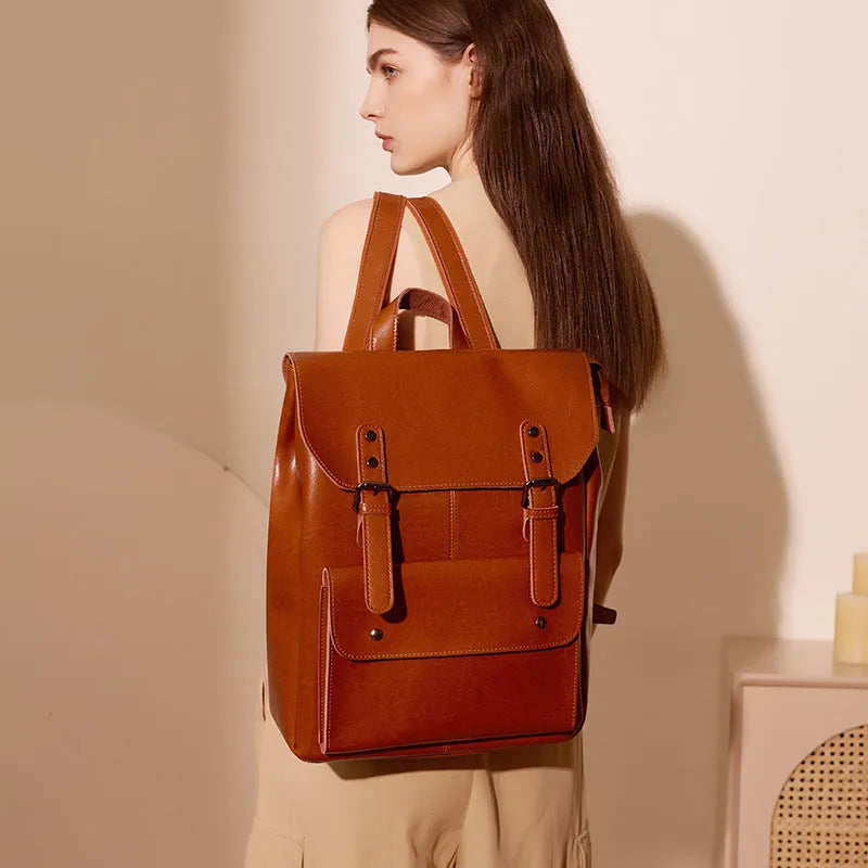 Genuine leather women's computer backpack in black, brown, and coffee brown colours