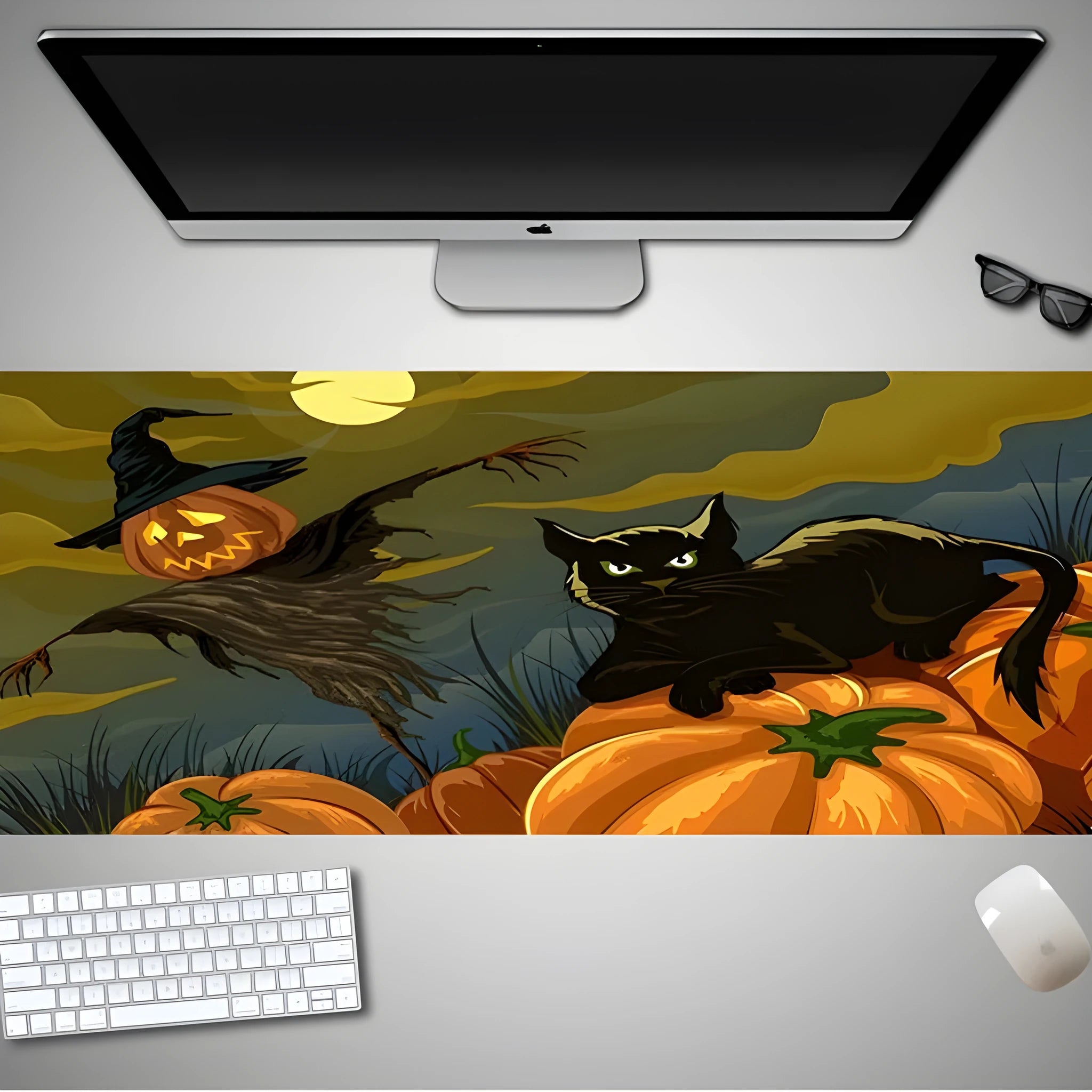 Oversized Halloween-themed gaming mouse pad with non-slip rubber base on a desktop
