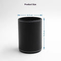 Black leather cylindrical pen holder measuring 8cm wide × 10.8cm tall on desk
