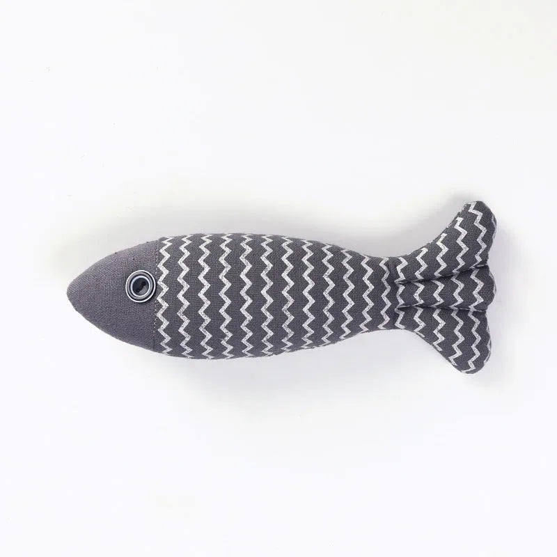 Set of three linen fish cat biting toys in navy blue, red, and yellow. Each measures 21x9x5cm.