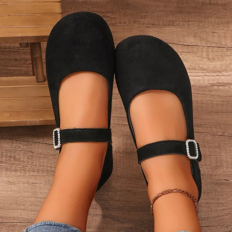 Black canvas fisherman shoes with low-top design and rubber soles