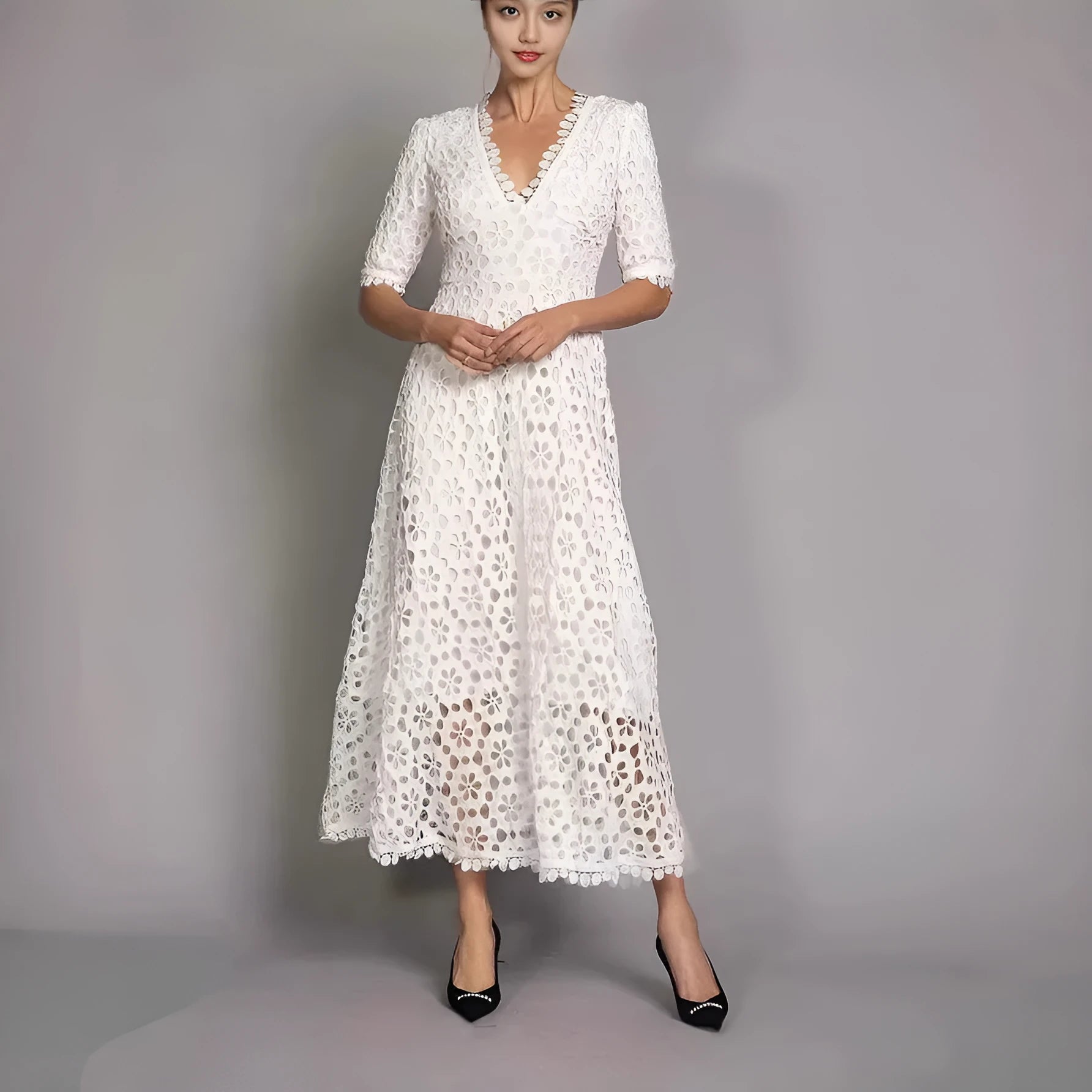 White lace long dress with V-neck design and hollow-out details for women