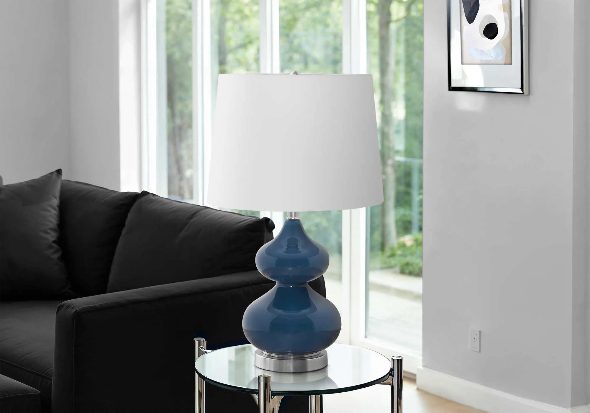 Blue crystal glass desk lamp with white fabric shade for a child's bedroom.