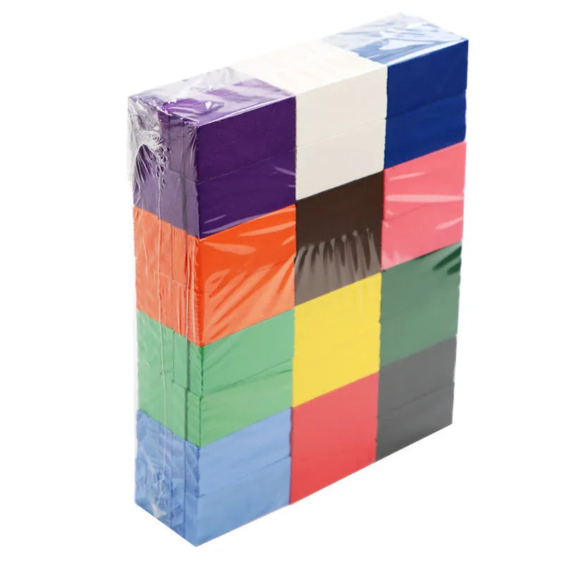 120-piece rainbow wooden domino blocks from pine wood with water-based paint on a flat surface