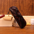 Leather glasses buggy bag in first layer cowhide with belt clip, shown in black, burgundy, brown or light brown.