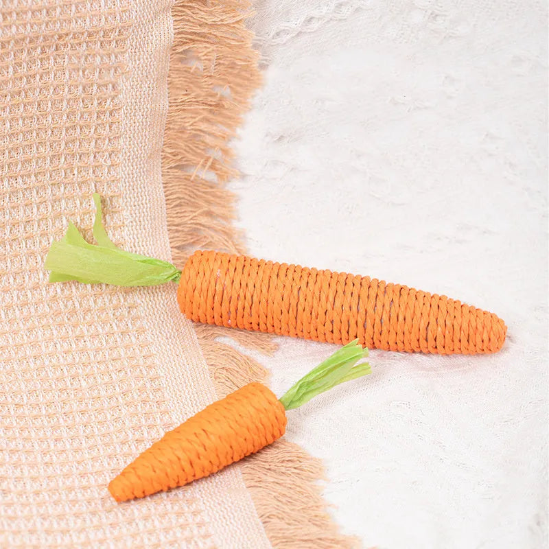 Set of interactive cat toys including carrot bites, paper toys with ringing stones, cat sticks, and tooth grinding sticks