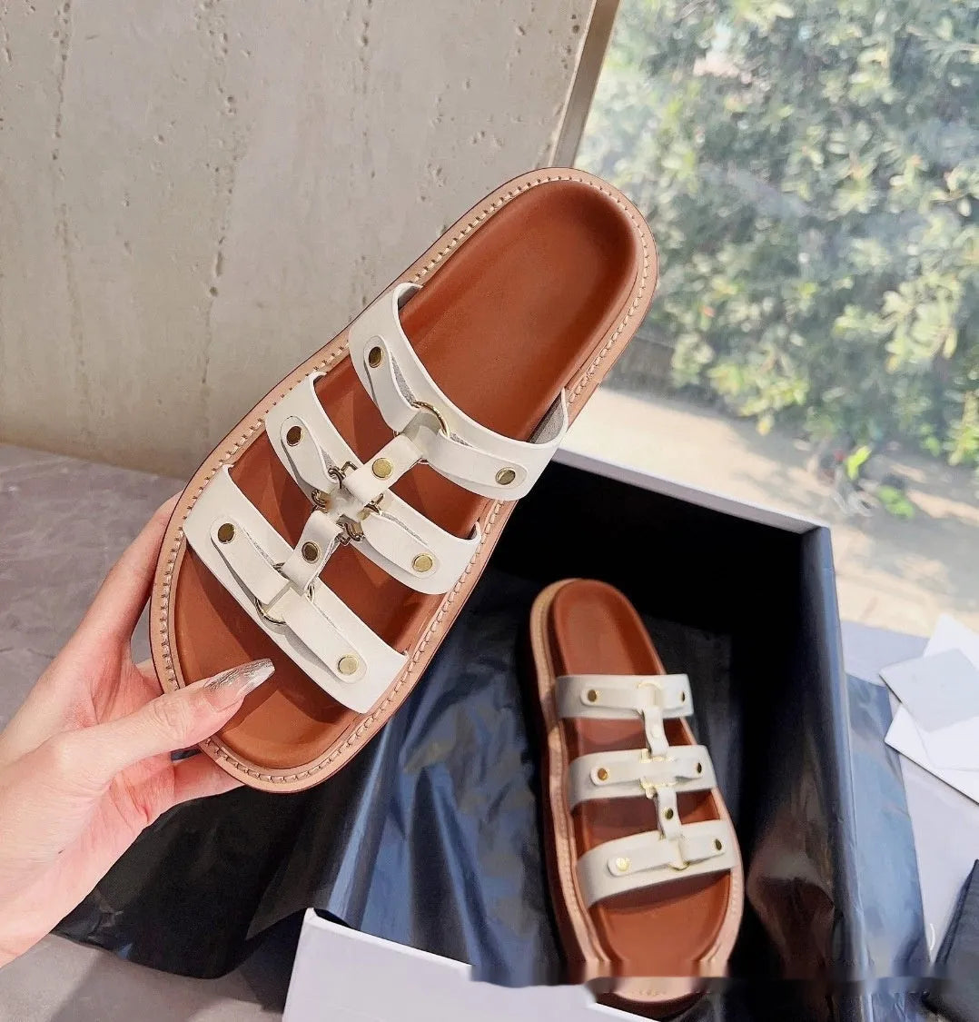 Women's white Roman sandal slippers made from sheepskin leather with patent leather finish
