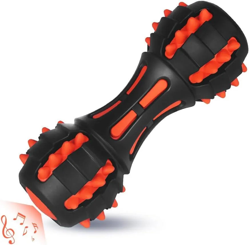 Red dumbbell-shaped durable rubber dog chew toy for large breeds on a white background.