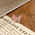 Copper women's butterfly ring charm with open loop, jewellery making component.