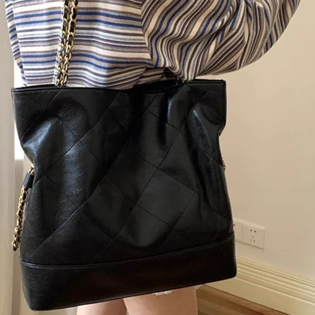 Large black PU shoulder handbag with diamond chain, vertical square shape, and double joint straps