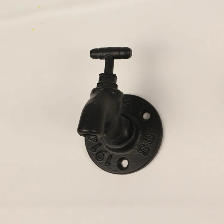 Wall-mounted metal water pipe style towel hook in a modern design