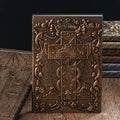 Tarot card retro embossed PU notebook in red bronze colour, A5 size with writing paper, closed view