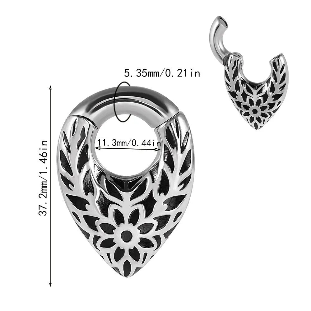 Stainless steel drop-shaped auricle ear extender with totem design on a round hanging egg form.