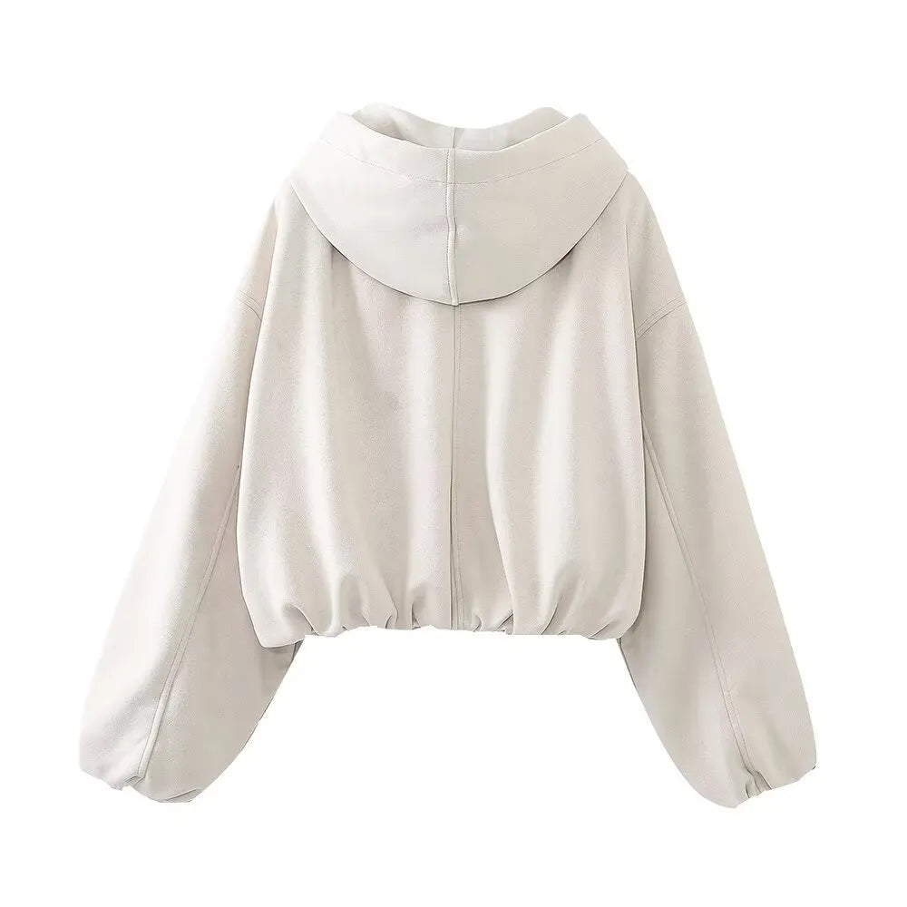 Women's suede hooded jacket in white and black colours showing casual styling