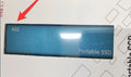 Ultra-thin external mobile solid-state drive with a metal shell, showing red interface connector.