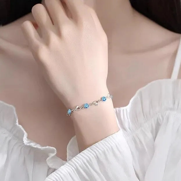 Blue beating heart necklace and bracelet set with mixed gem inlay on electroplated copper