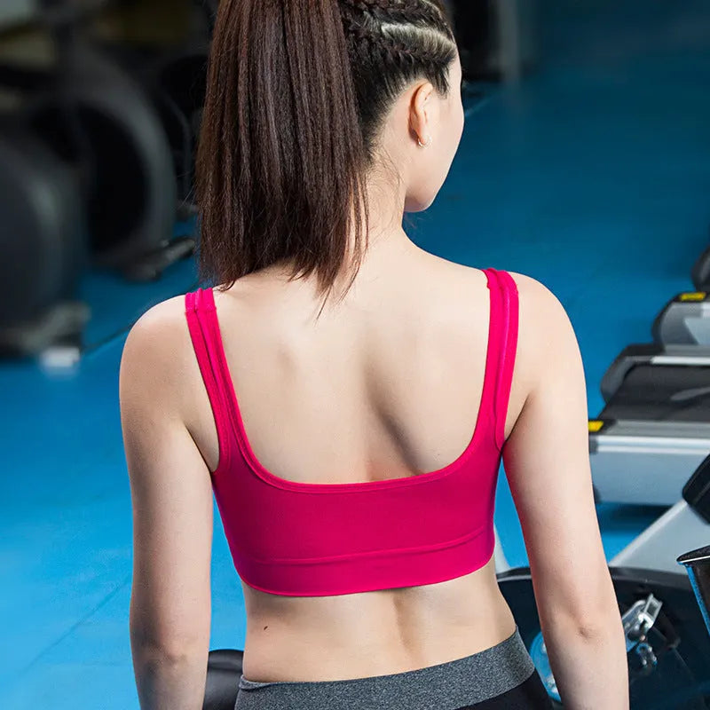 Women's reinforced shockproof sports bra showing fixed double-shoulder straps and 3/4 cup design