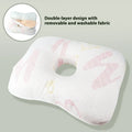 Beauty salon single hole ear pillow in Boer Grey colour on a treatment bed.