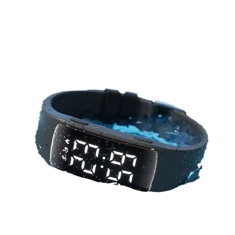 Smart waterproof vibration alarm watch with LED display on a silicone strap, shown in multiple colour options.