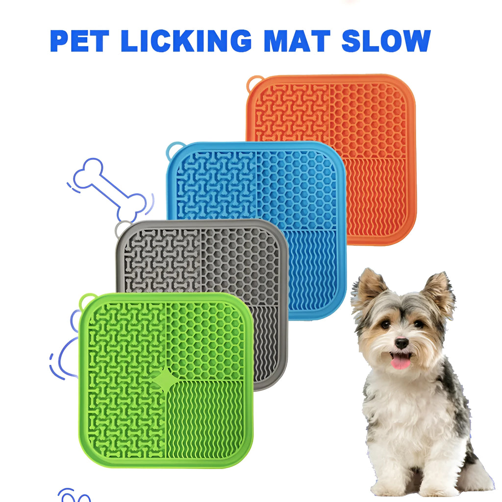 Square orange silicone dog licking mat with textured surface and suction cups on back.