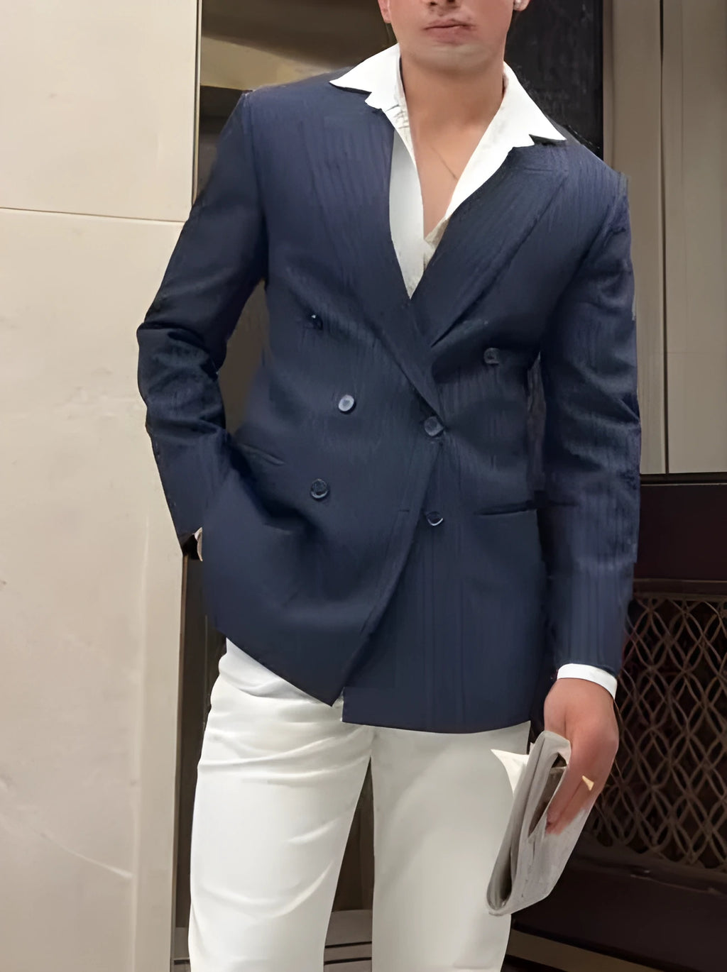 Men's classic stripe double-breasted blazer jacket on a hanger