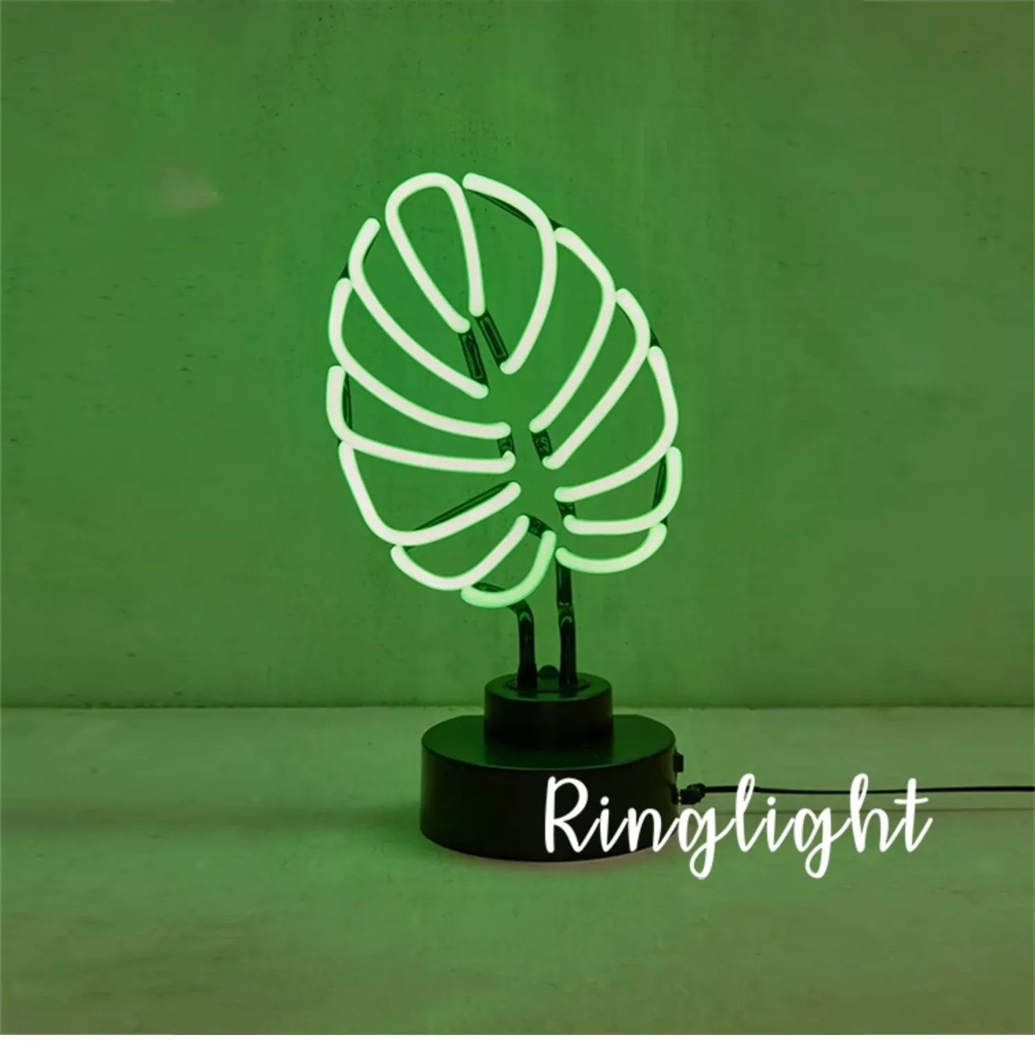 Minimalist bamboo-shaped desktop lamp with USB cable and green illumination