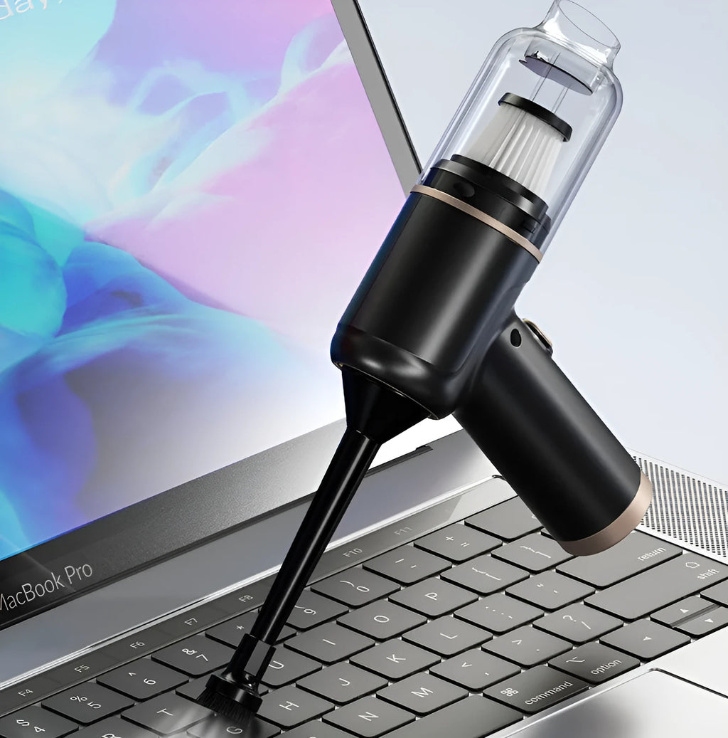 Black wireless handheld car vacuum cleaner with multiple nozzle attachments on charging cable