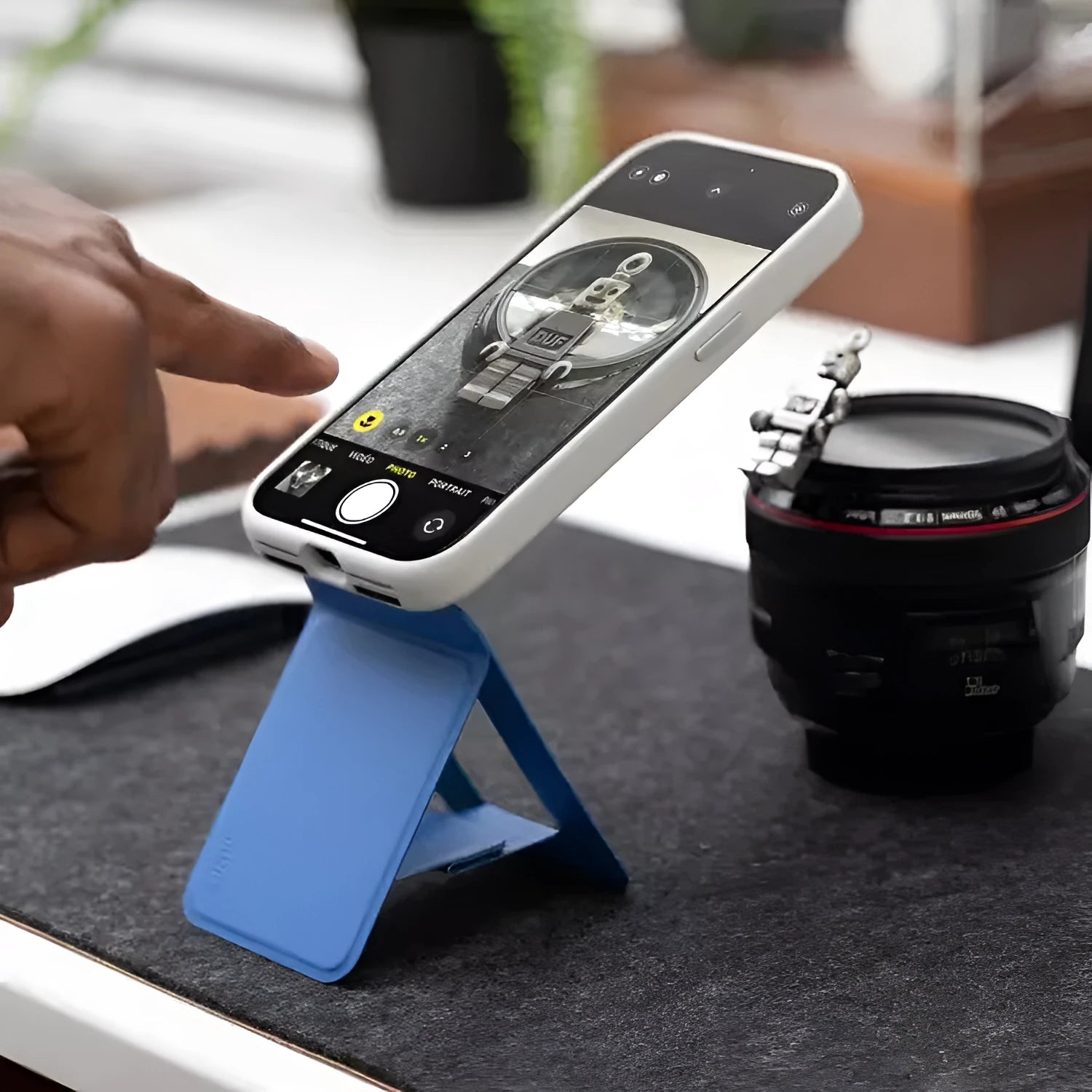 Slim black magnetic mobile phone holder and case showing dimensions and leather finish.