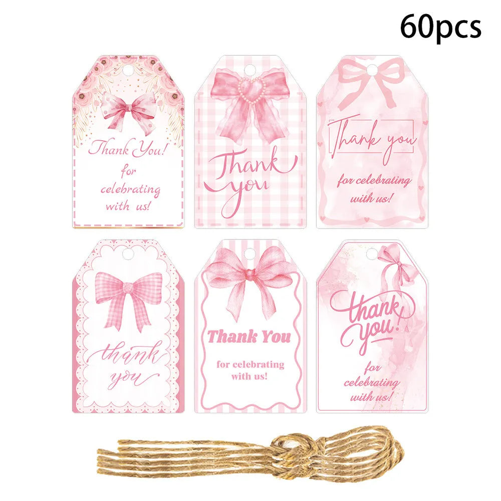 Three styles of bowknot-themed paper gift tags with natural hemp rope for birthday parties