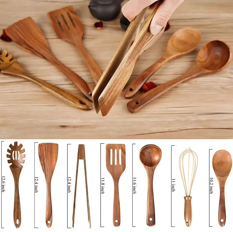 Natural wood 7-piece cooking utensil set for non-stick pans on a kitchen counter.