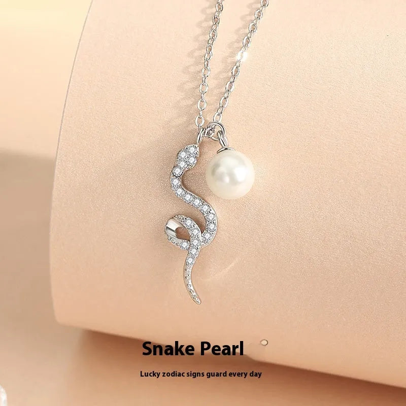 925 silver animal pendant necklace with platinum rose gold colour and Oring chain on a white background