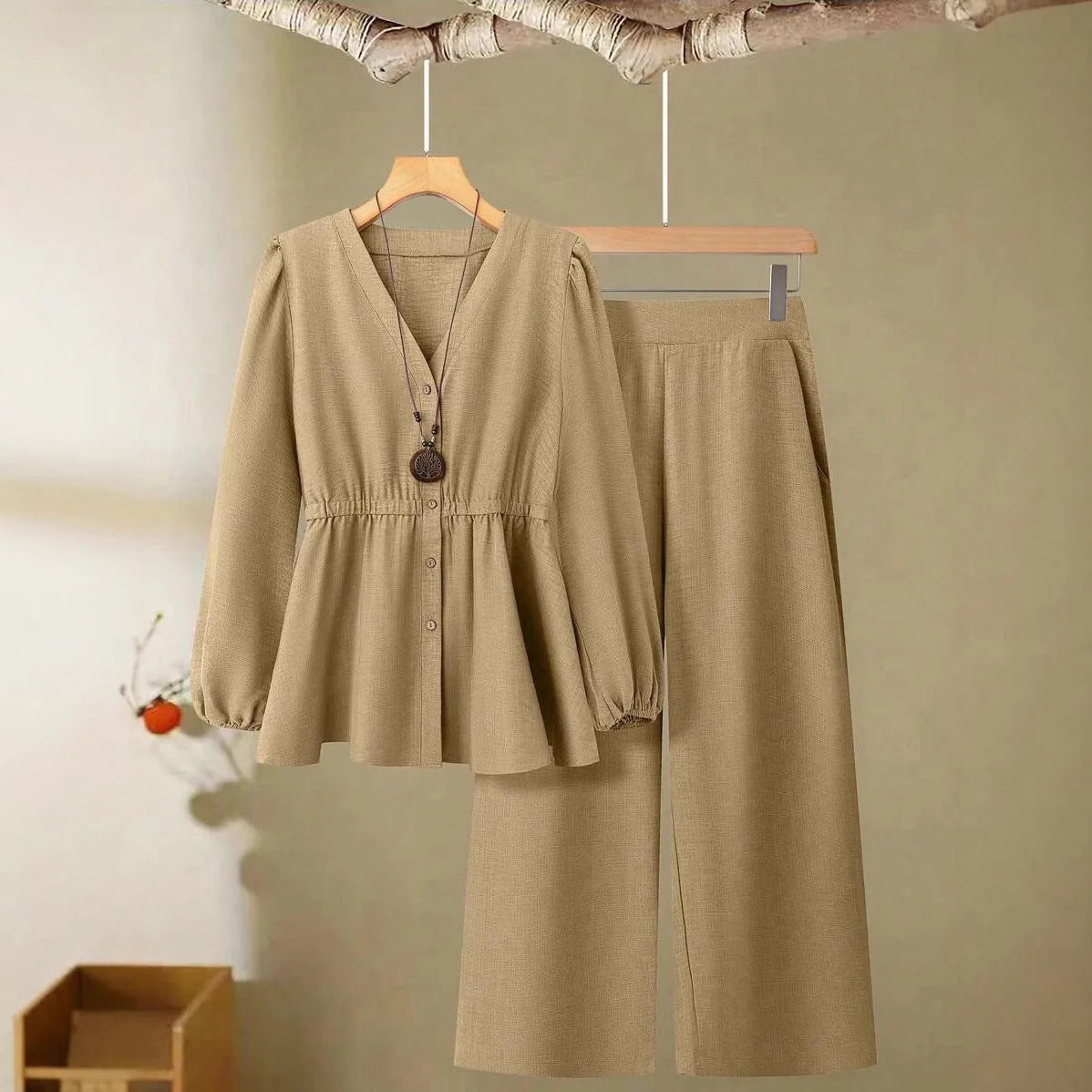 Women's polyester two-piece suit in khaki with long sleeves, button detailing, and matching trousers