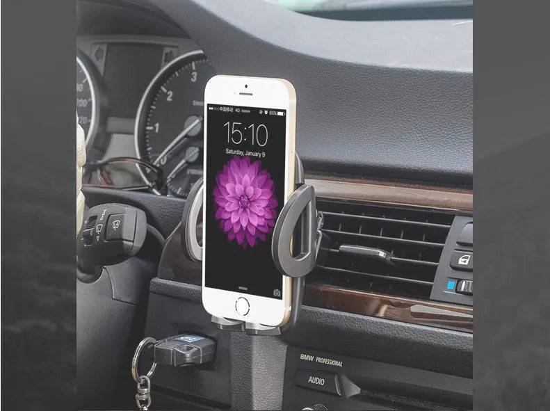 Black plastic car air conditioning outlet mobile phone holder mounted in vehicle vent