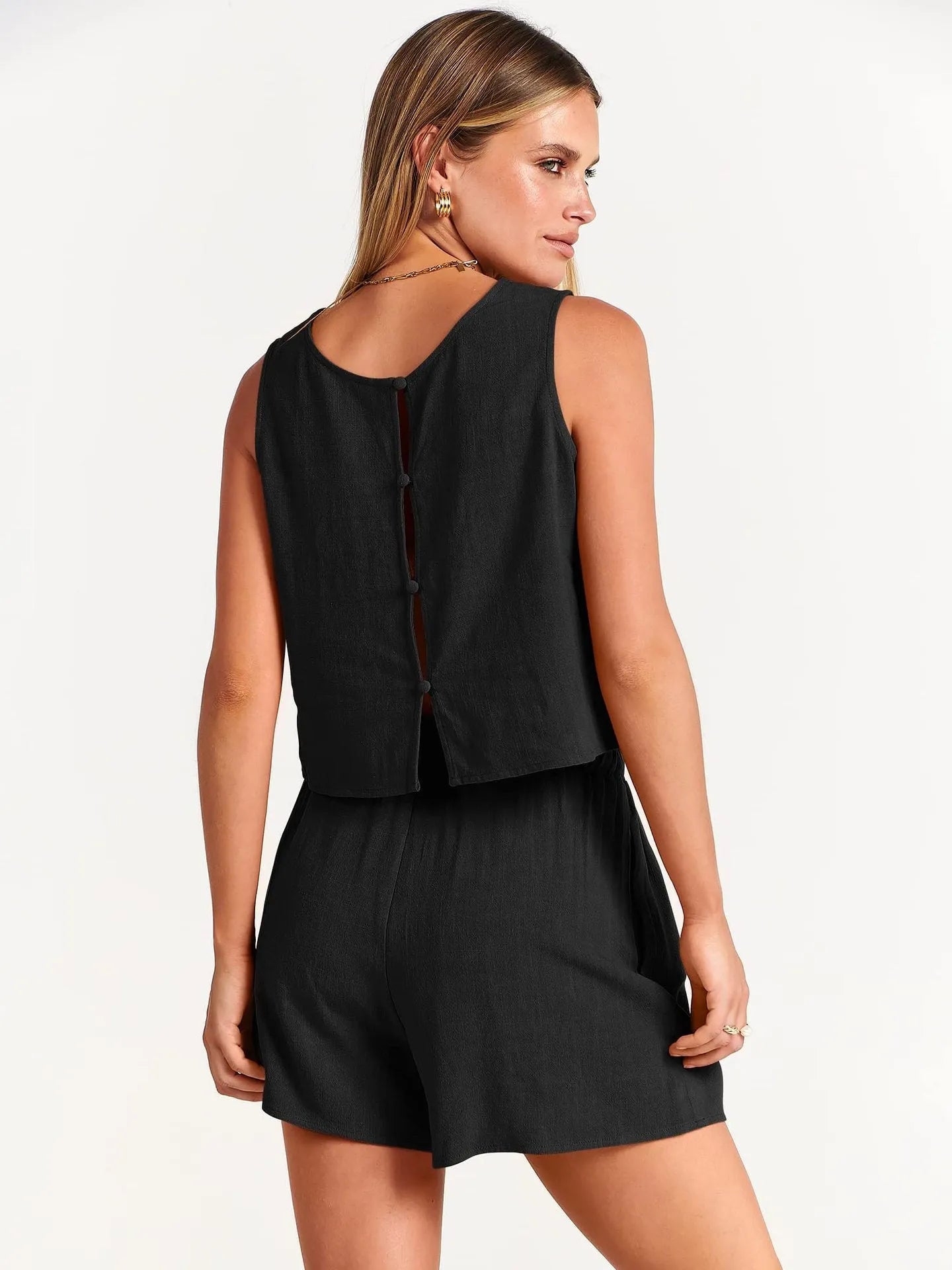 Women's apricot-coloured sleeveless top and matching drawstring shorts from a rayon-linen summer two-piece set.