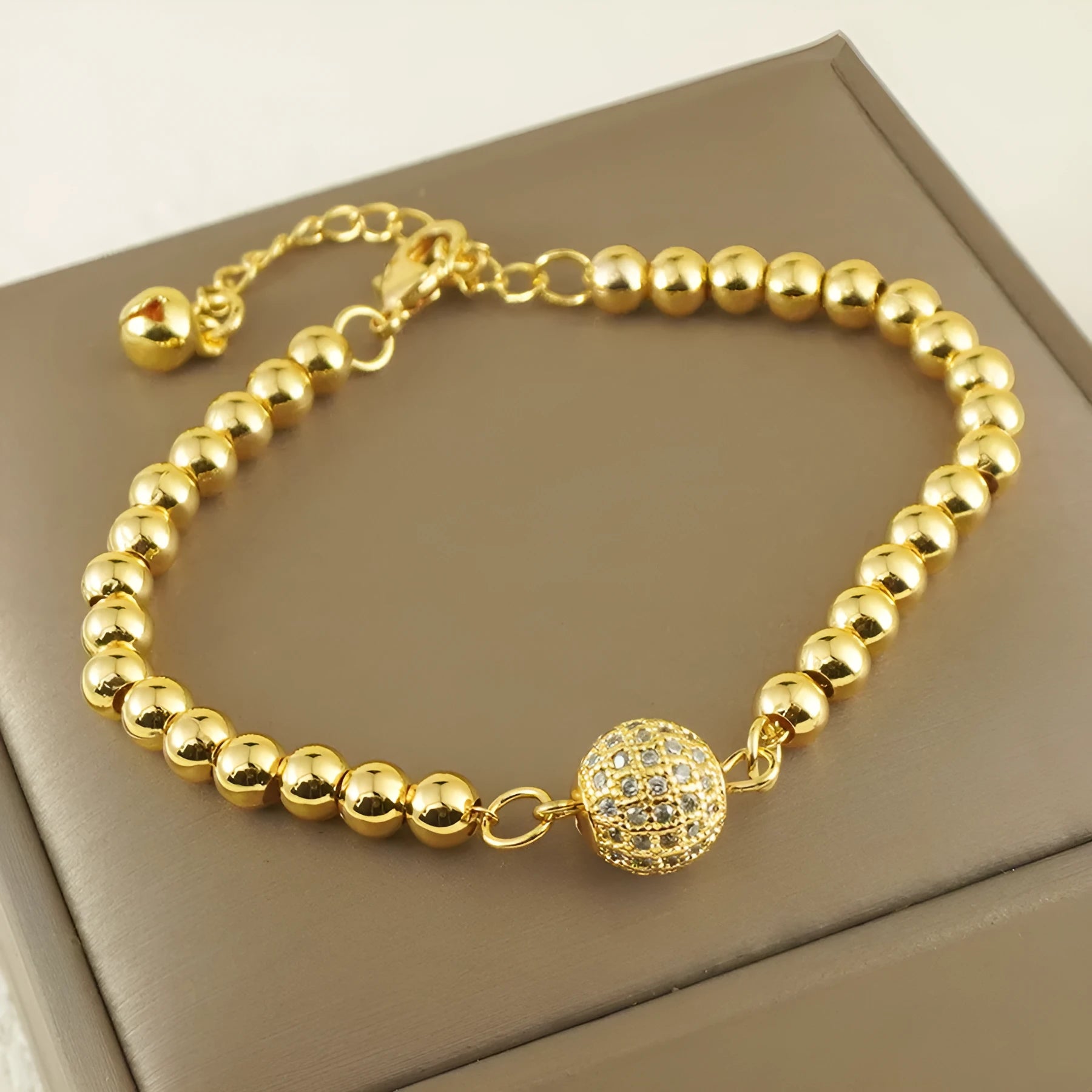 Arabic style heart-shaped copper bracelet for women with a round zircon stone centrepiece.