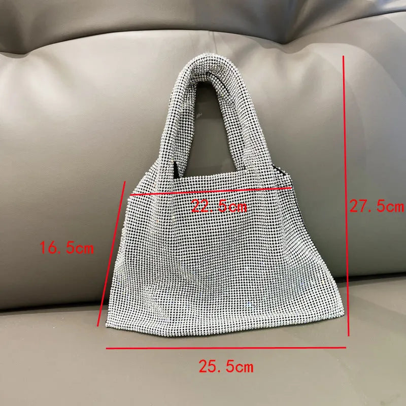 Silver cotton thread party handbag with rhinestone detailing and open outer pocket