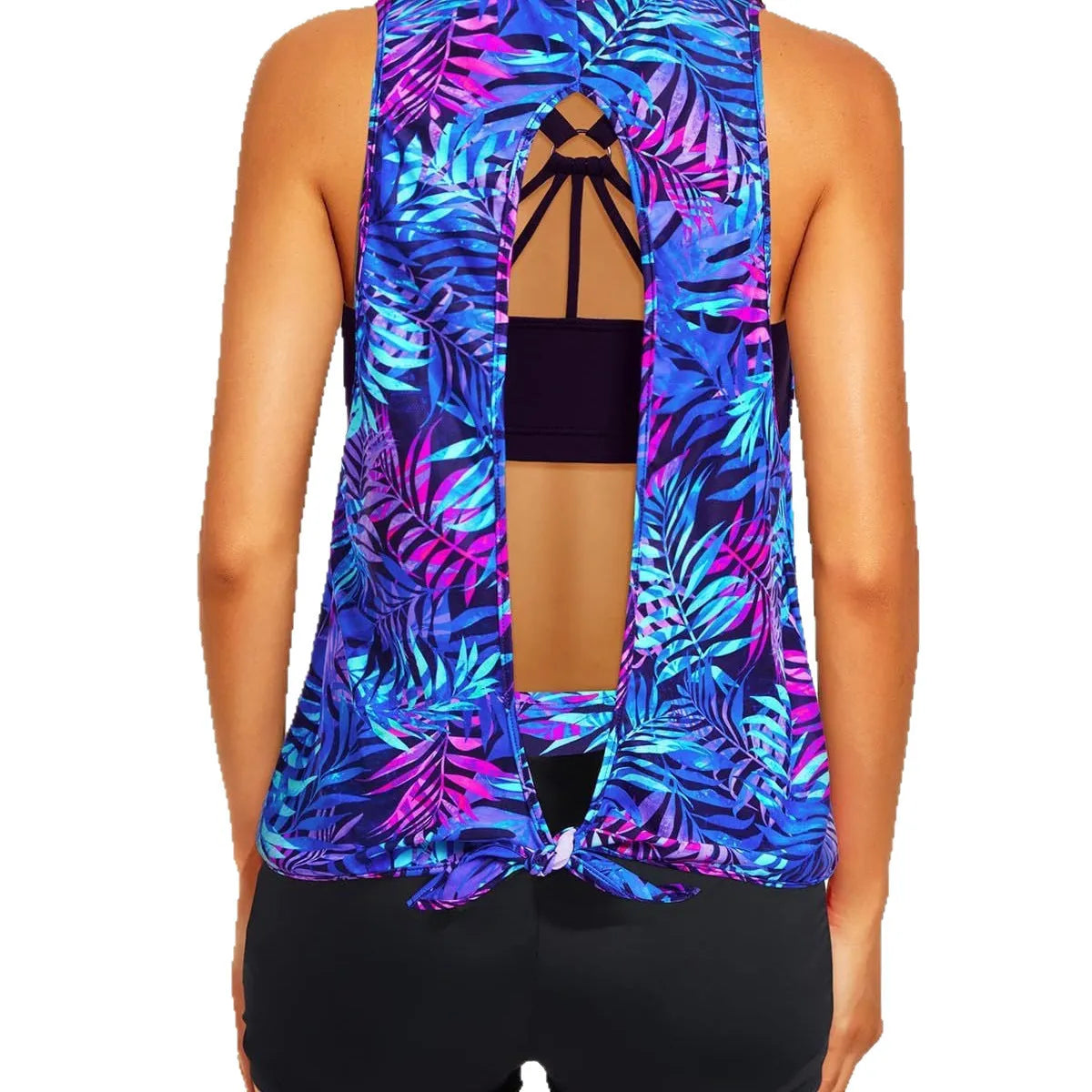 Women's printed three-piece swimsuit set with short sleeve top, vest, and shorts in peacock blue, showing hollow backless design and covered belly.