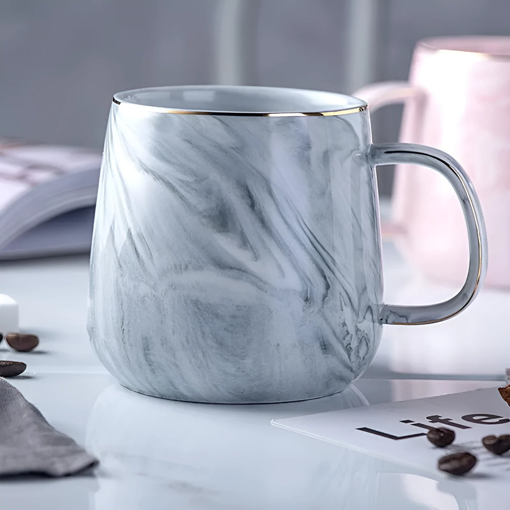 Ceramic mug with marble pattern, 320ml capacity, grey colour, on a table