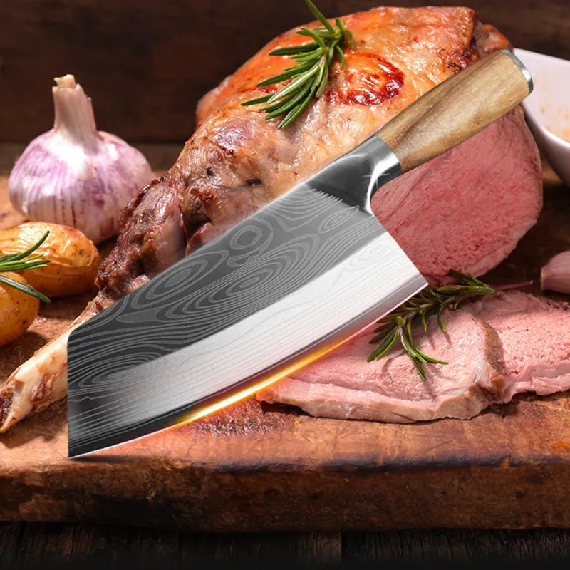 320mm long stainless steel kitchen knife with a sharp blade on a kitchen counter.