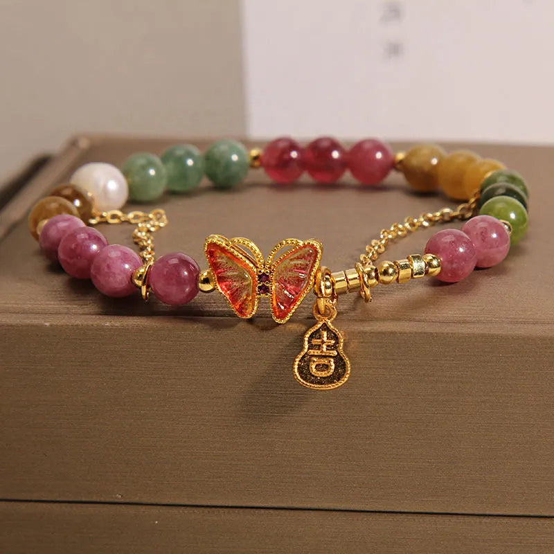 Natural jade coloured agate bracelet with butterfly-gourd tourmaline detail for women.