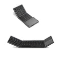 Black tri-fold Bluetooth keyboard shown unfolded next to folded silver version