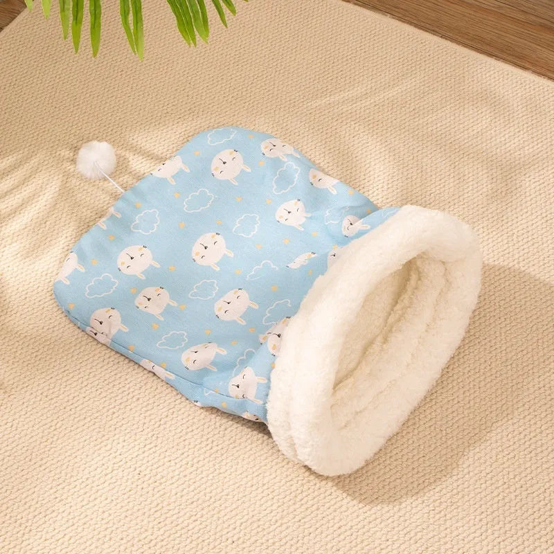 A soft flannel cat sleeping bag nest bed measuring 50 by 40 cm.