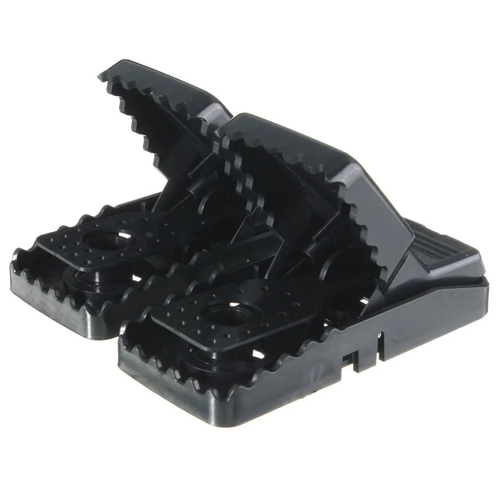 Six black plastic snap mousetraps showing dimensions and smooth surface.