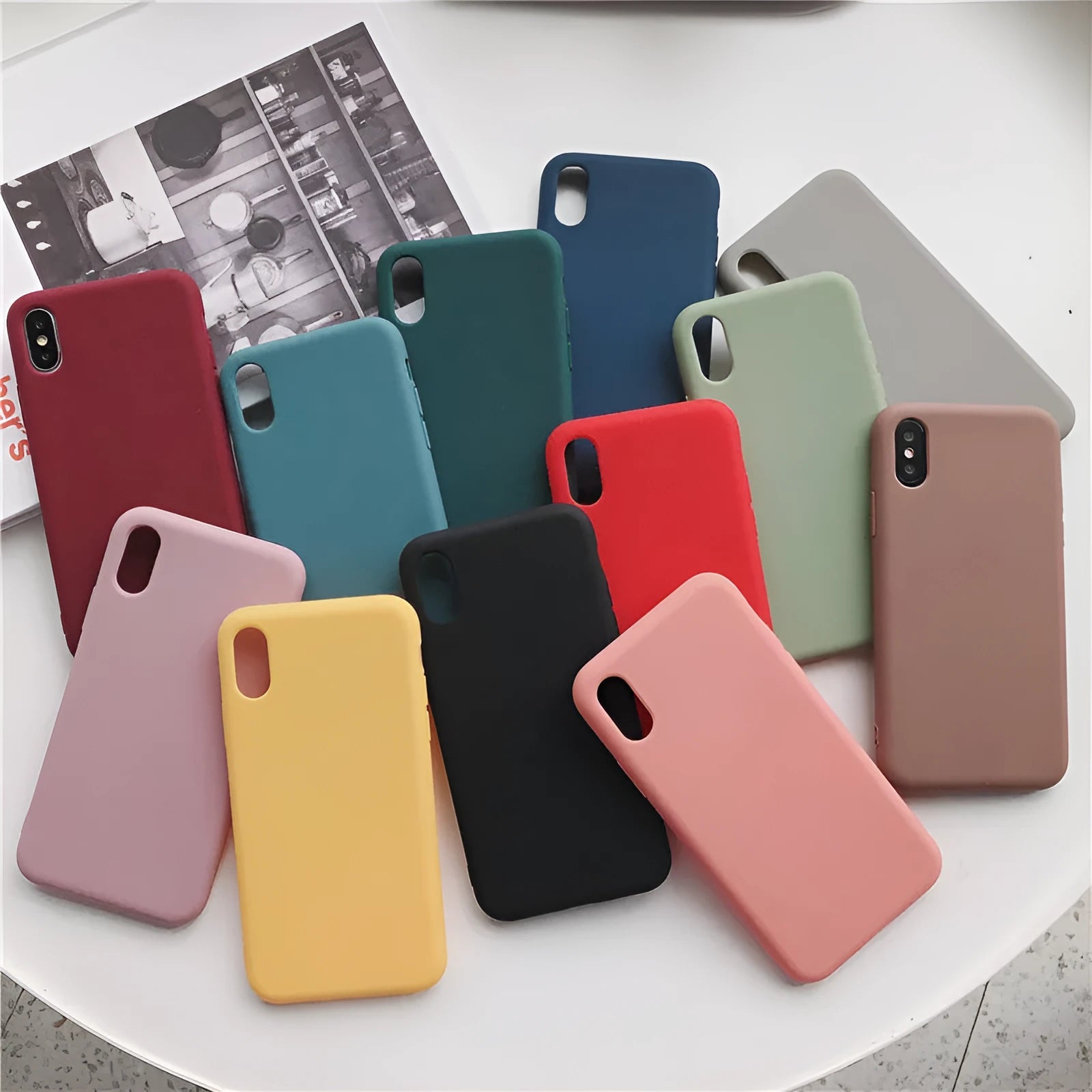 Silicone phone case for iPhone XR and XS Max shown in wine red, light blue, and black colours.
