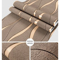 Close-up of dark brown 3D curve stripe textured wallpaper with deerskin velvet finish.