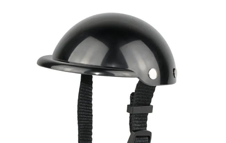 Black pet motorcycle helmet with adjustable strap for dogs and cats on white background