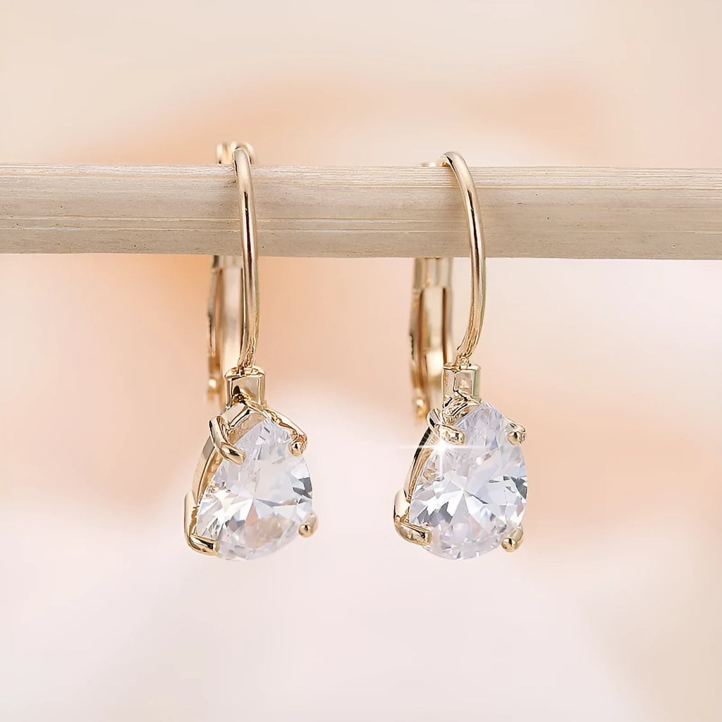 Pair of drop-shaped fashion earrings with gem inlay in gold or platinum plating