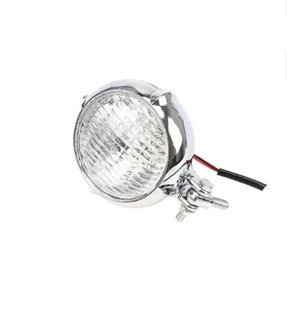 Black retro-style Harley motorcycle headlight with an 8cm diameter cast aluminium housing.