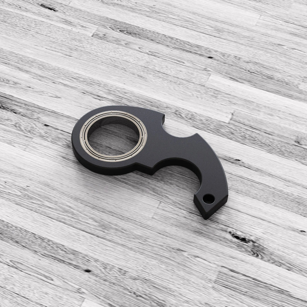 Creative fidget spinner keychain in black with plastic and zinc alloy construction, featuring a bottle opener